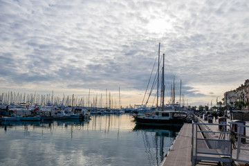 Fototapeta na wymiar Yachts harbor in Cannes, South France