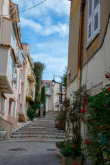 Street with stairs at the end in Cannes, France