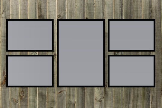 Collage of blank picture frames on old wooden background. Design, interior decor, mock up