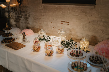 photo of a candy bar table in a wedding