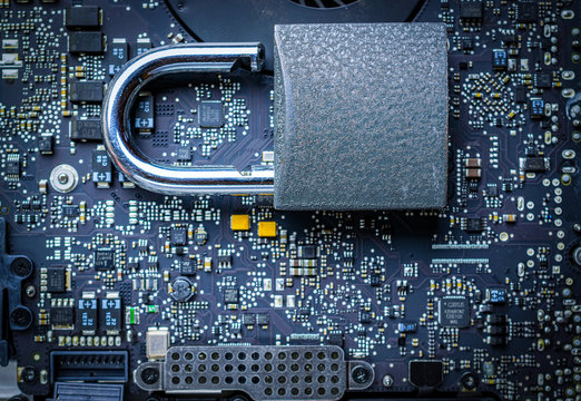 Data protecting Security Concept. Computer Internet protection with lock, key on microscheme chip. System Shield Protection Verification.
