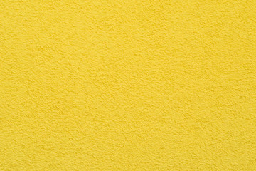yellow structural wall . yellow background . exterior plaster of the house - obrazy, fototapety, plakaty
