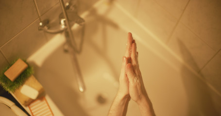 Washing hands with a view from the top