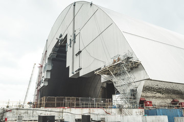 Chernobyl Abandoned Nuclear Plant. Nuclear Plant visible reactor no. 4 in Chernobyl Exclusion Zone. The sarcophagus on the photo before was moved over the reactor.