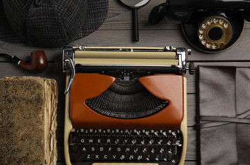 Flat lay composition with vintage detective items on grey wooden background