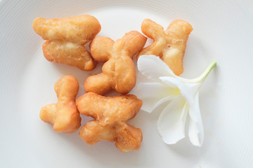 Deep fried Chinese doughnut. traditional breakfast with coffee or tea, Asian food