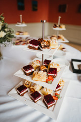 photo of cake pieces on a cake stand