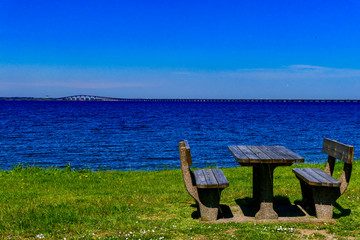 Farjestaden, Oland, Sweden The Oland bridge and a picnic table. © Alexander
