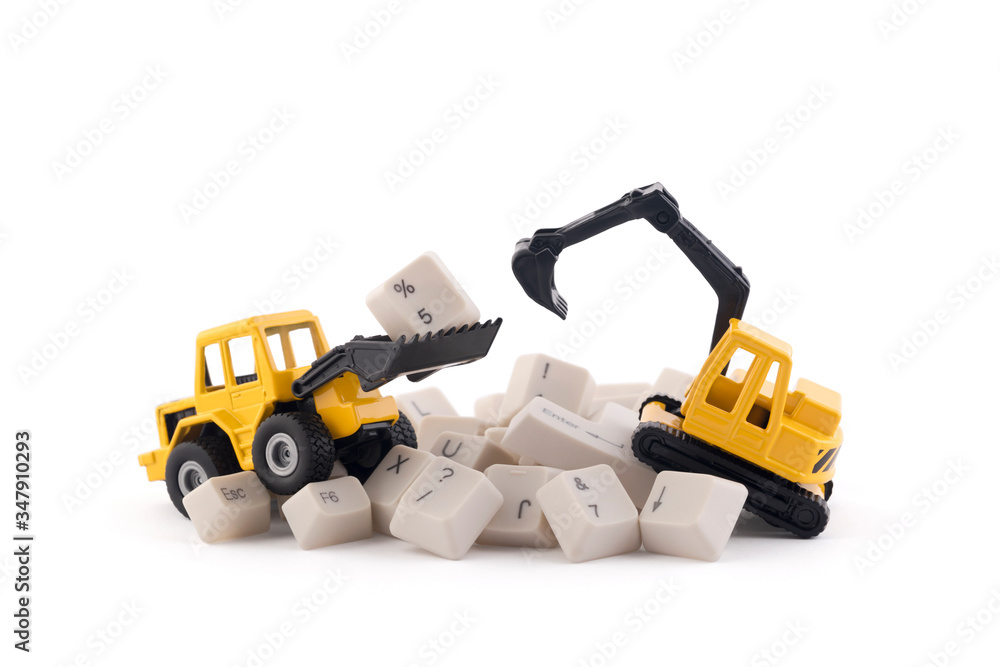 Poster bulldozer and excavator working on computer keys isolated on white background with clipping path. we