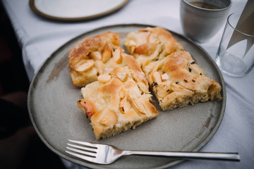 photo of an apple pie pieces in a plate