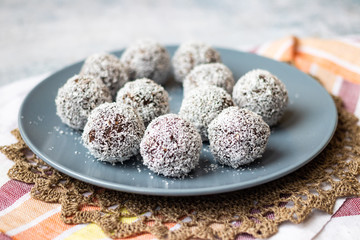 Coconut chocolate vegan healthy energy balls. Sweet dessert bonbons