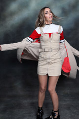 Beautiful, glamourous blonde girl posing in studio on isolated background. Style, trends, fashion...