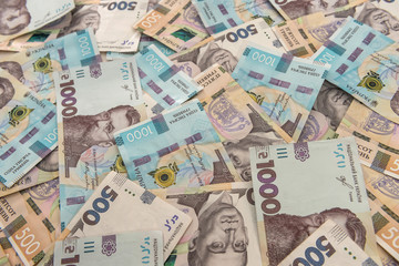 Fototapeta na wymiar Background with Ukrainian money for design. UAH. New notes 500 and 1000.