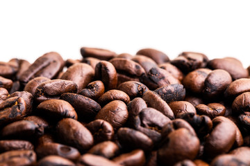 Coffee beans in front of white background. 