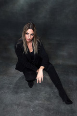 Beautiful, glamourous blonde girl posing in studio on isolated background. Style, trends, fashion...