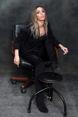 Beautiful, glamourous blonde girl posing in studio on isolated background. Style, trends, fashion...