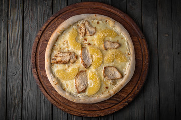 Tasty hot italian pizza with chicken and pineapple. Pizzeria menu. Concept poster for Restaurants or pizzerias