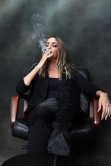Beautiful, glamourous blonde girl posing in studio on isolated background. Style, trends, fashion...