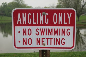Fototapeta premium Angling Only (No Swimming, No Netting) Sign
