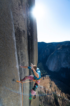 Rock climber falling on big wall while climbing the Nose el Capitan