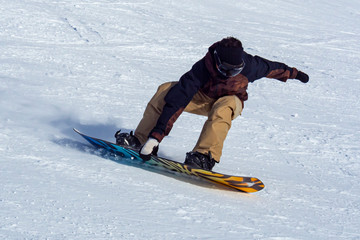 Snowboarder on a slope in the alps