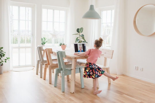 girl having a video call with a nurse in hospital dancing for her - Powered by Adobe