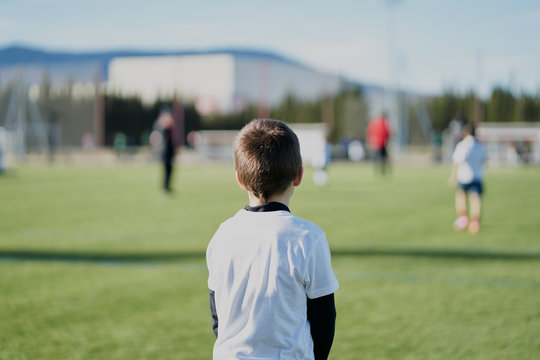 gatekeeper children soccer player in action. stadium