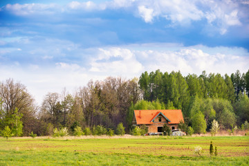Construction of a new house  from a ceramic blocks and red roof