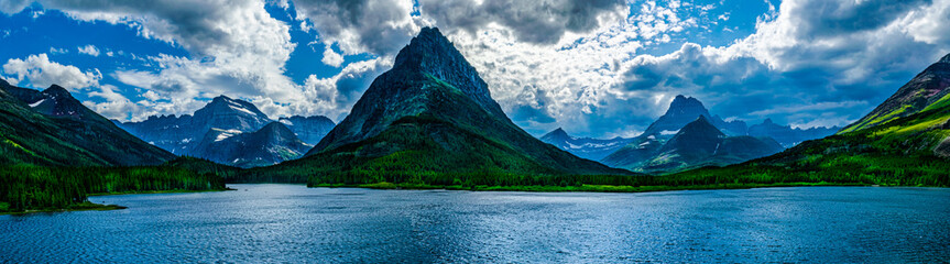 0000289_Panoramic scene of Grinnell Point at Swiftcurrent Lake near Many Glacier Hotel -  Glacier...