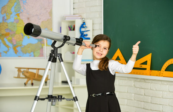 Observation Concept. Astronomy And Astrophysics. Stars And Galaxies. Study Telescope. School Astronomy Lesson. School Girl Looking Through Telescope. Telescope Tripod In Classroom. School Hobby Club