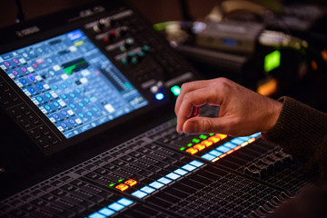 Sound engineer working in recording studio