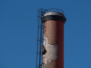 industrial chimney with blue sky