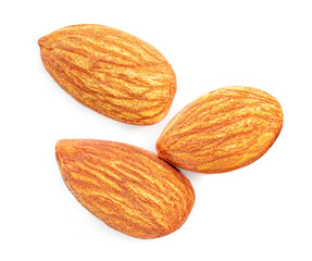 Almonds isolated. Raw Almond nuts on white background. Top view. Flat lay