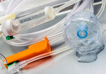 Detail of oxygen mask and water drops, conceptual image