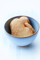  Butter cookies on bright wooden background. Copy space.