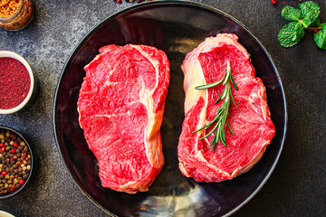 raw steak meat (beef or veal cooking) menu concept keto or paleo diet
background. top view. copy spaces for text