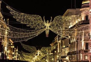 City street with illumination between houses