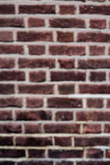 Background of minimalist wall with dark red bricks