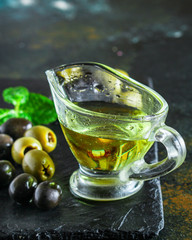 olive oil appetizer olives, cold pressed, 
menu concept food background. top view. copy spaces for text for text keto or paleo diet