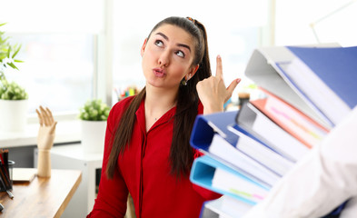Girl is unhappy with number folders man carries