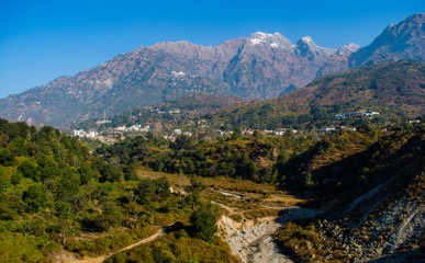 Scenic Aerial Scene - River between two mountains of himalayas, aerial view, crystal clear water
