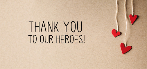 Thank You to Our Heroes message with handmade small paper hearts