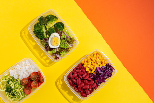 Homemade vegan food in lunch boxes with healthy vegetable fresh from above. Vegan food concept. Healthy food. Flat lay. Top view