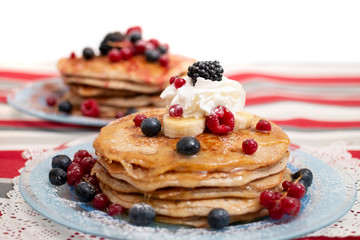 oats and banana pancakes with berries
