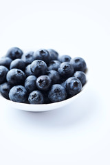  Bilberries isolated on white background. Concept for healthy nutrition. Copy space.