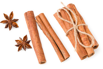 cinnamon with star anise isolated on white background. top view