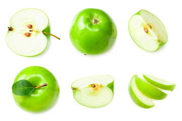 green apples with slices isolated on white background. top view