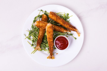 Tempura deep fried shrimp fish with tomato sauce. street food.