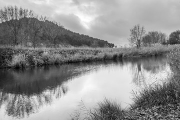 Henares river as it passes through Alcalá de Henares in winter: hiking route behind the sports city.