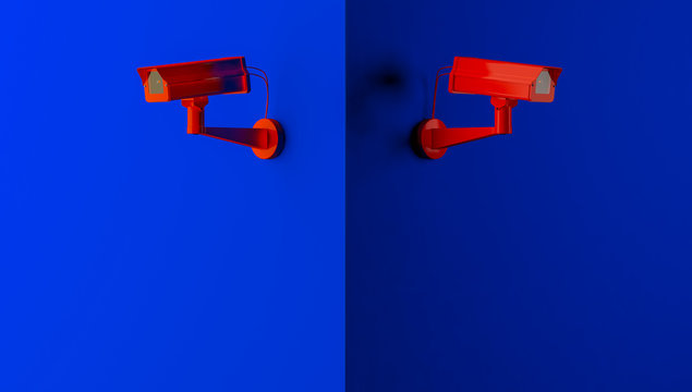 Red surveillance camera on blue background monitoring people on the street. Camera to search for quarantine offenders caused by Coronavirus